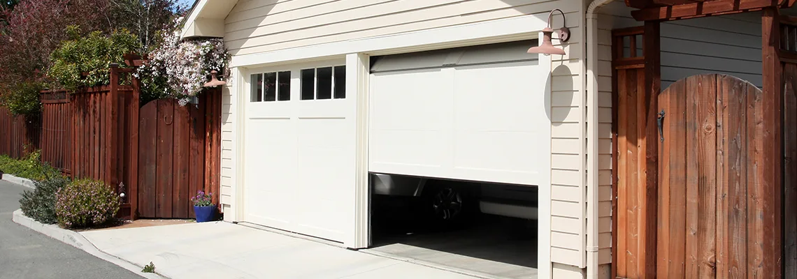 Fix Metal Garage Door Jerking in Danville, Illinois